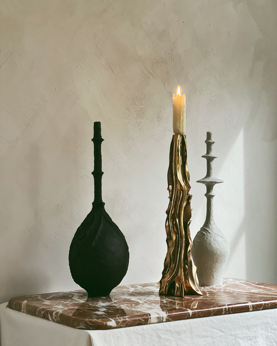 Candlestick, polished bronze by Fakasaka
