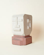 Load image into Gallery viewer, Vintage carved stone block head sculpture in a modernist style. Featuring a contrasting stone base and porous finish. Sourced in the United Kingdom. 
