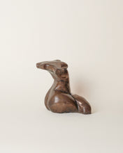 Load image into Gallery viewer, Explore is a cast bronze sculpture of the female form by Artist Dorri Buchholtz. Her body is writing; tension is palpable in her arched back and contorted legs.
