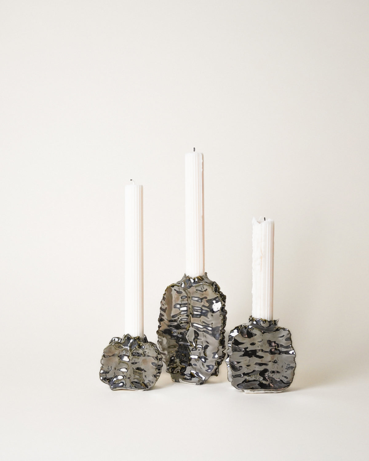 metallic silver candle holders